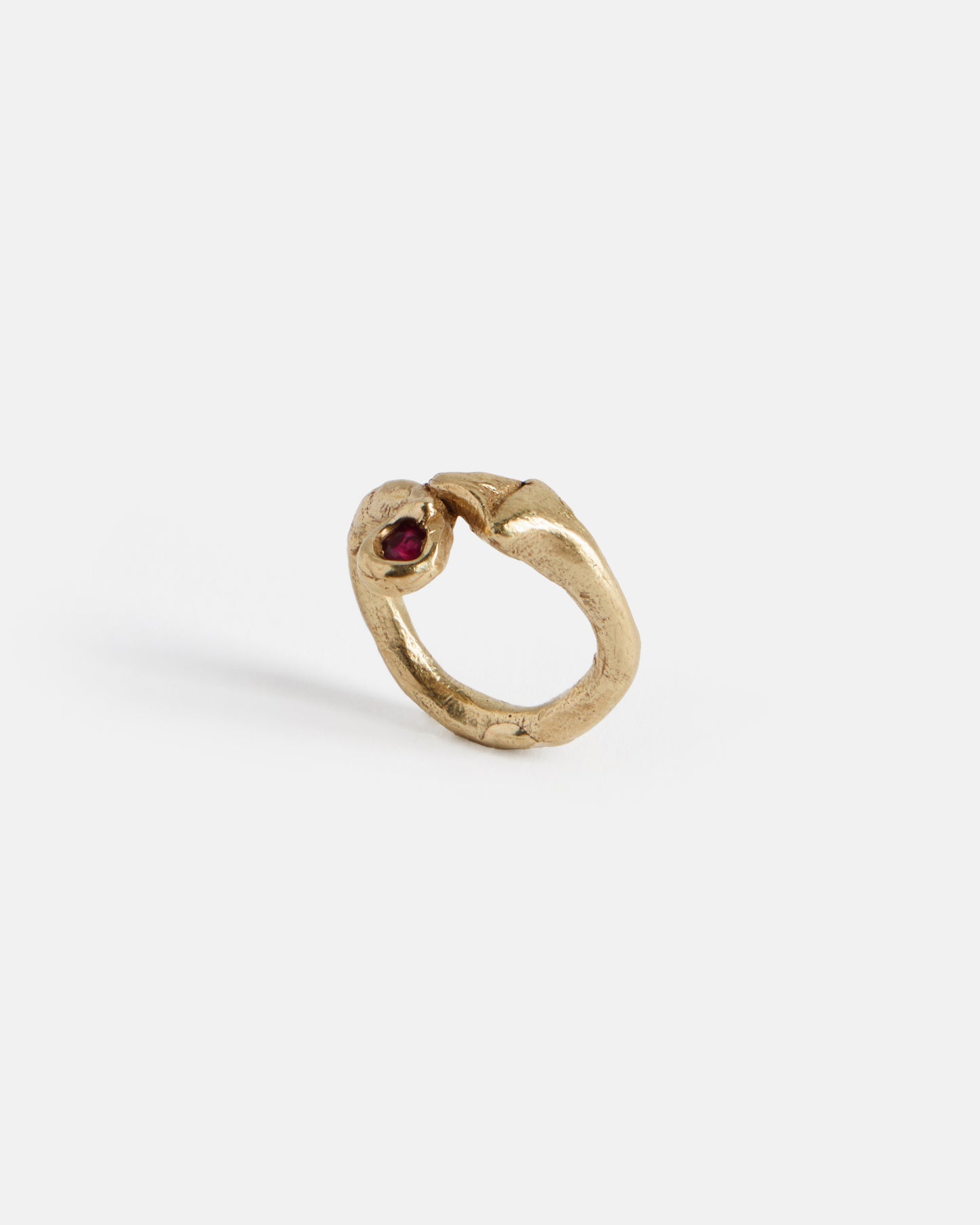 Snake With a Snack: solid gold and ruby ring